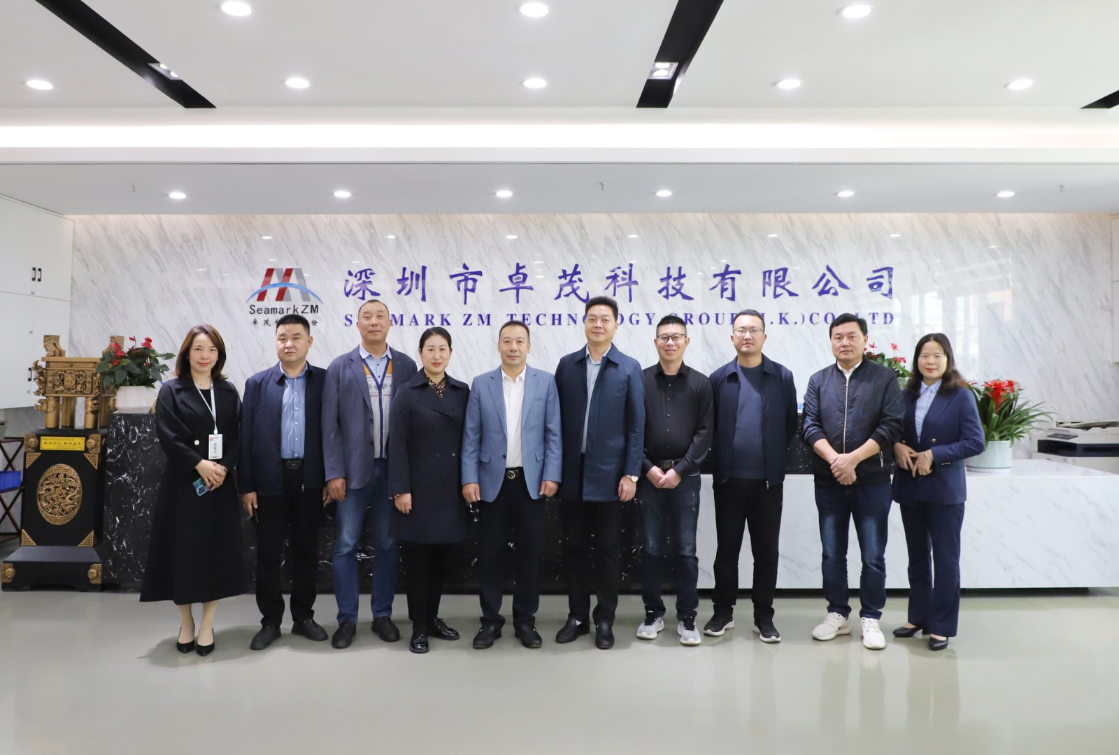 聞總與湖北省?？悼h政府副縣長龔夫一行合影.jpg